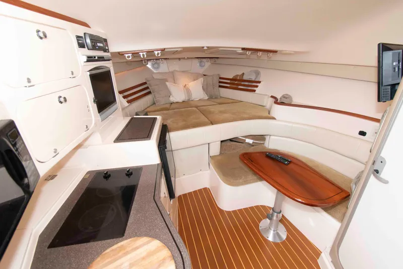 Slide: The Image of Electrical control panel on a 2007 Grady-White Express 330 boat. - 27