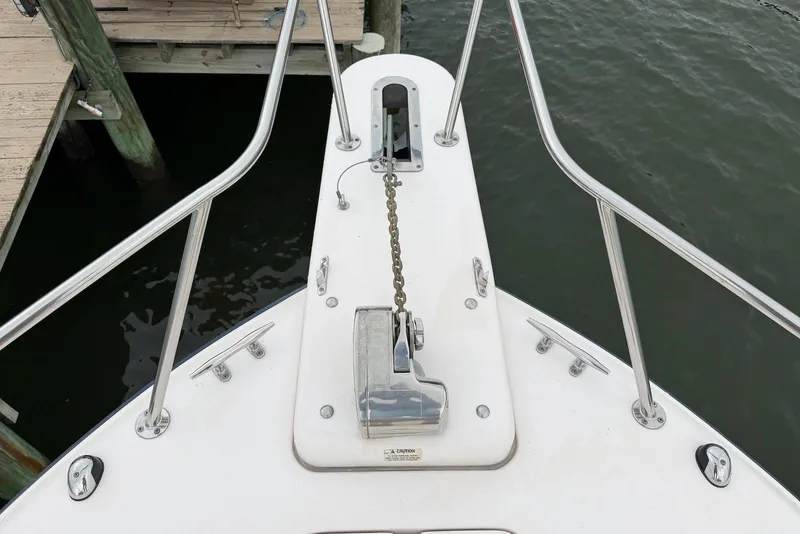 Slide: The Image of Bow of 2007 Grady-White Express 330 boat with anchor chain and railing. - 3