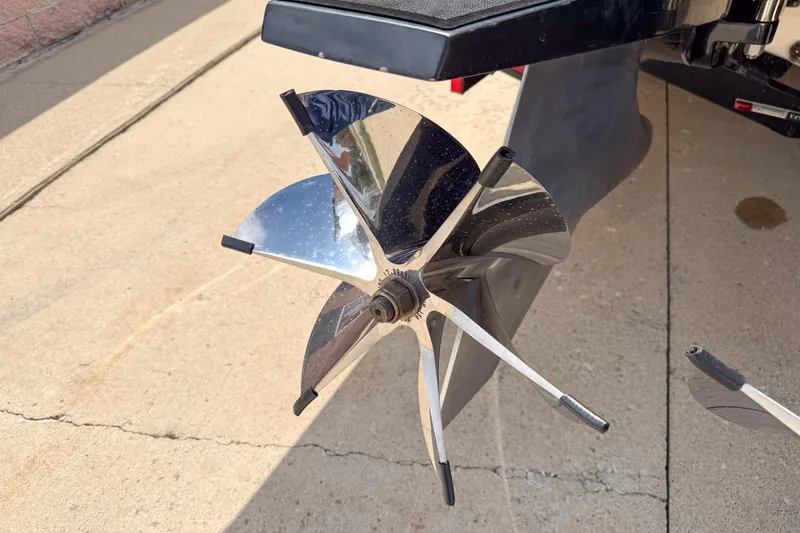 Slide: The Image of Propeller of a 2007 Fountain 42 Lightning boat on a concrete surface. - 14