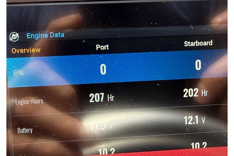 Slide: The Image of Display screen showing engine data for 2007 Fountain 42 Lightning boat. - 28