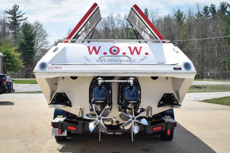 Slide: The Image of 2007 Fountain 42 Lightning boat with dual propellers, parked outdoors. - 3