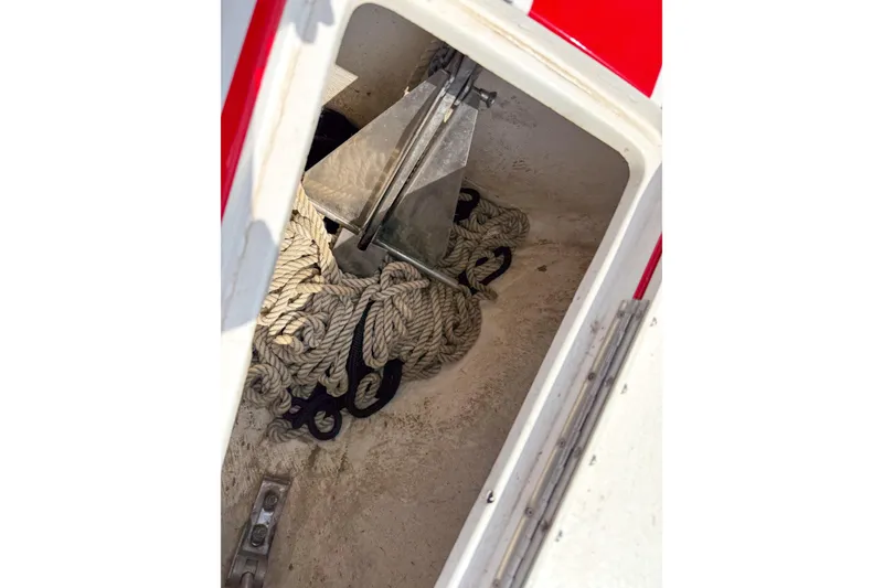 Slide: The Image of Anchor and rope storage in 2007 Fountain 42 Lightning boat compartment. - 35
