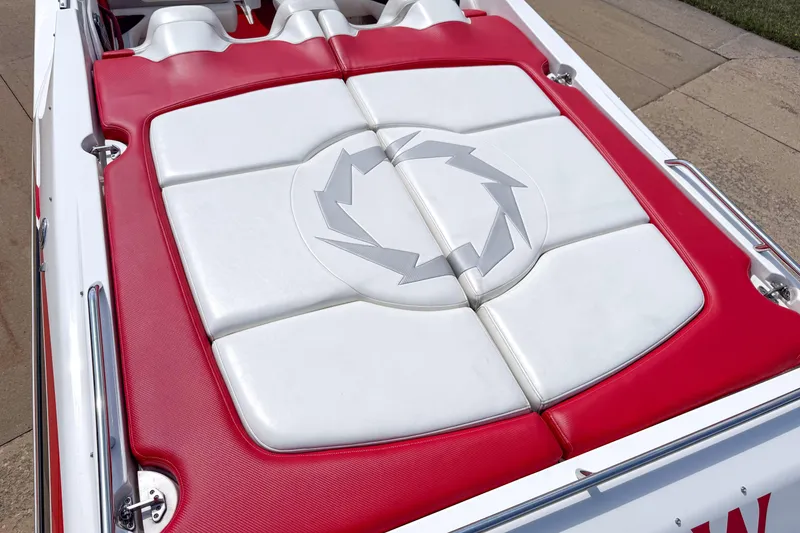 Slide: The Image of 2007 Fountain 42 Lightning boat with red and white seating, featuring a stylish emblem design. - 36