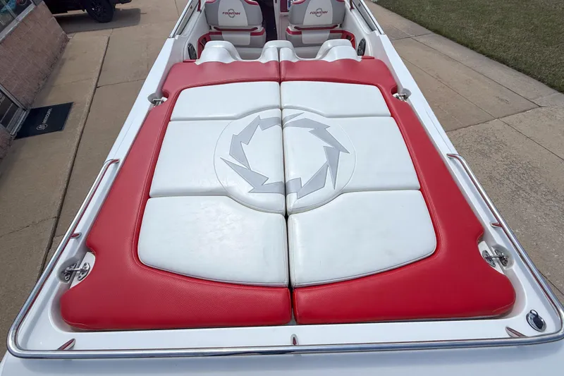 Slide: The Image of 2007 Fountain 42 Lightning boat with red and white seating, showcasing sleek design. - 37