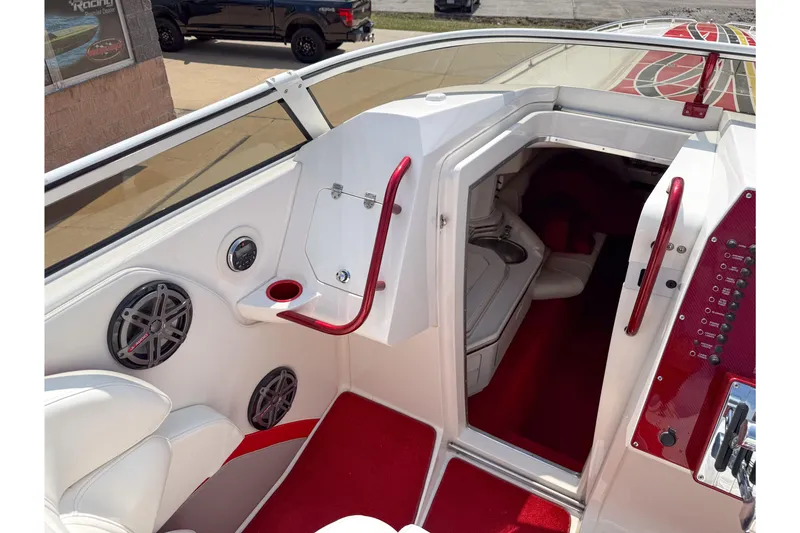 Slide: The Image of Interior of 2007 Fountain 42 Lightning boat with red accents and seating area. - 44