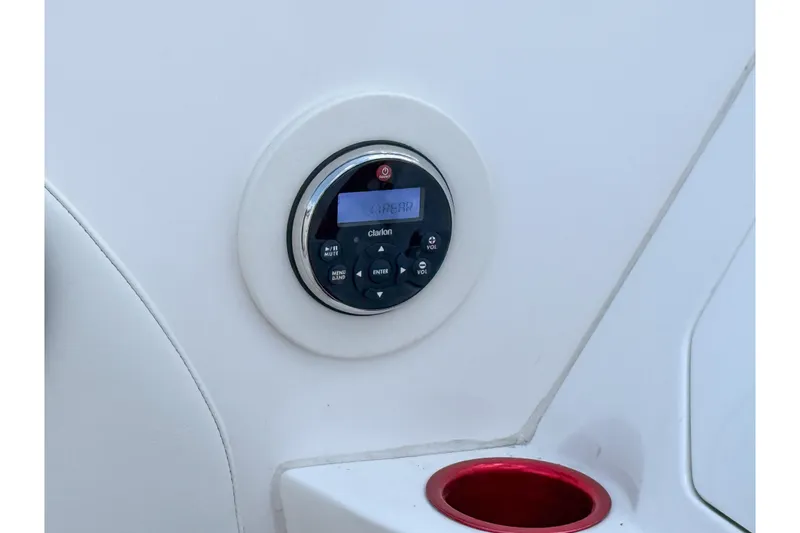 Slide: The Image of Control panel on 2007 Fountain 42 Lightning boat with cup holder. - 45