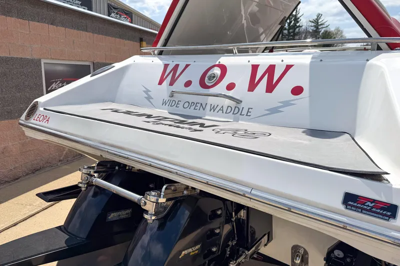 Slide: The Image of 2007 Fountain 42 Lightning boat with "Wide Open Waddle" text on the stern. - 52