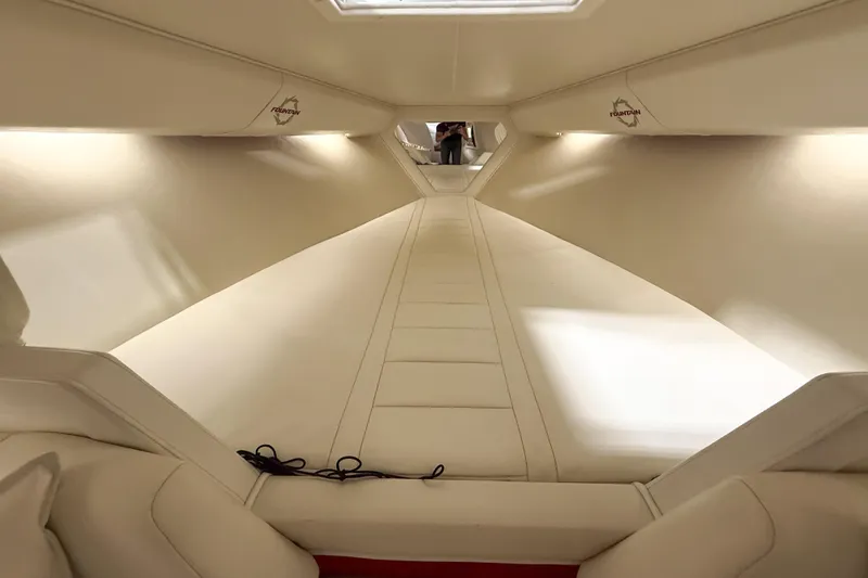 Slide: The Image of Interior of 2007 Fountain 42 Lightning boat, featuring sleek, white upholstery and modern design. - 53