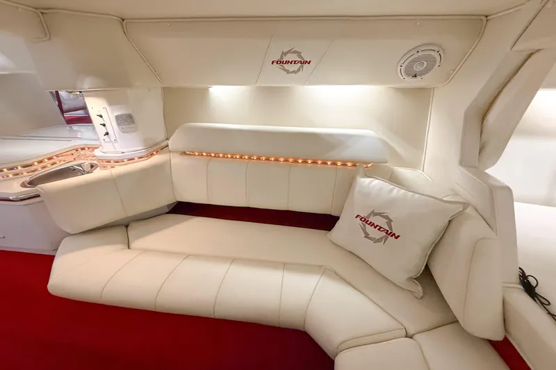 Slide: The Image of Luxurious interior of a 2007 Fountain 42 Lightning boat with plush seating and ambient lighting. - 56