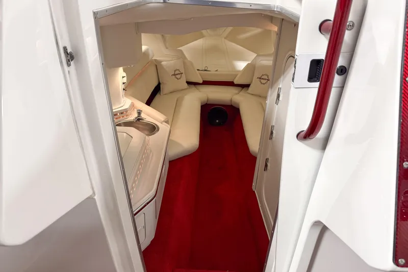 Slide: The Image of Interior of 2007 Fountain 42 Lightning boat with red carpet and white seating. - 61