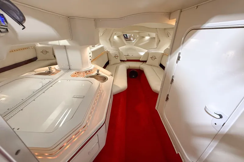 Slide: The Image of Interior of 2007 Fountain 42 Lightning boat with white seating and red carpet. - 63