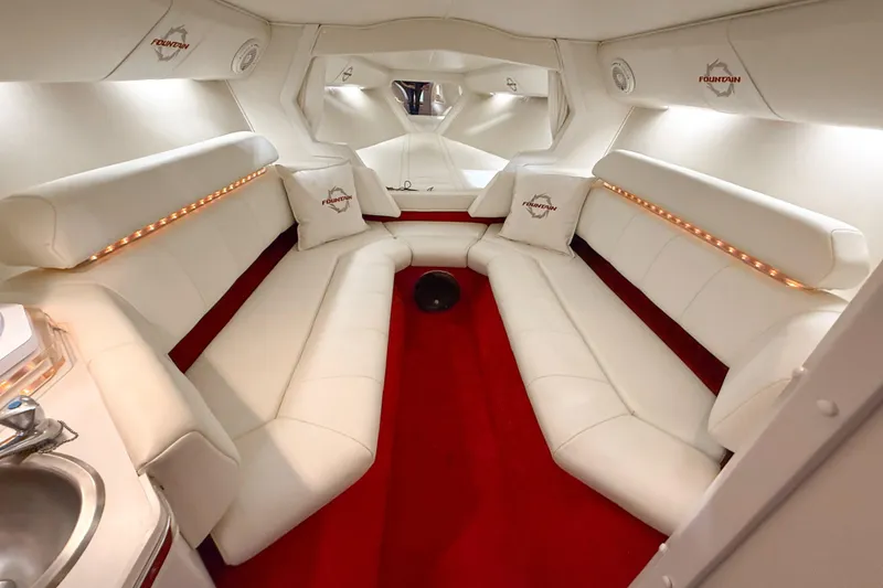 Slide: The Image of Luxurious interior of 2007 Fountain 42 Lightning boat with white seating and red carpet. - 65