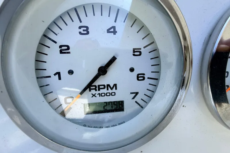 Slide: The Image of Close-up of RPM gauge on 2015 Walker Bay 450 Generation boat. - 11
