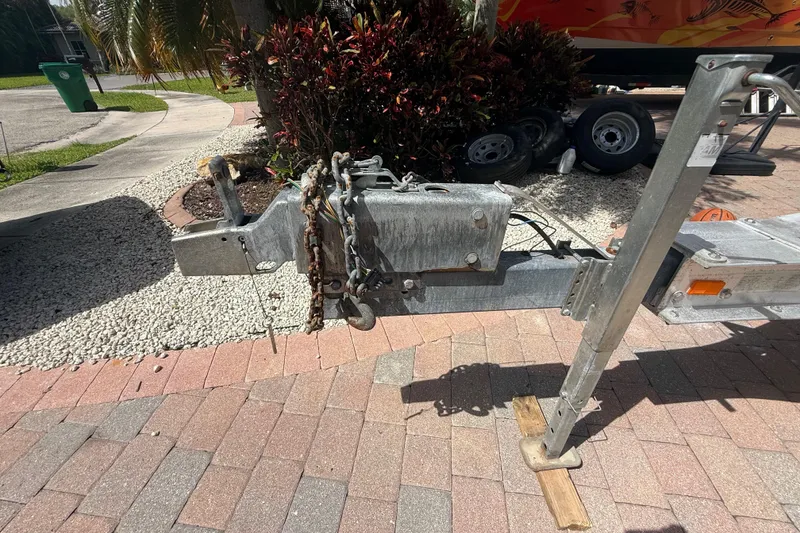Slide: The Image of Trailer hitch for 2007 Boston Whaler 270 Outrage on brick driveway. - 28