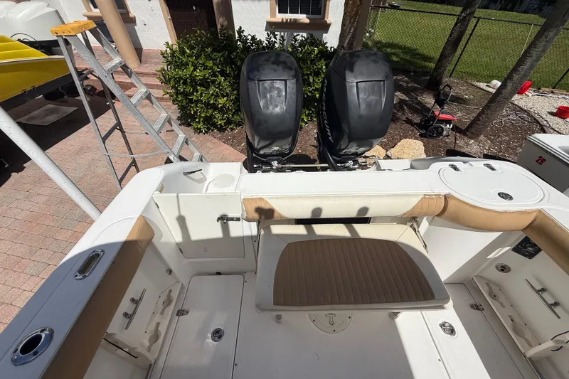 Slide: The Image of 2007 Boston Whaler 270 Outrage boat interior with twin Mercury engines. - 48