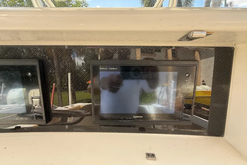 Slide: The Image of Dashboard of a 2007 Boston Whaler 270 Outrage with Garmin GPS display. - 63