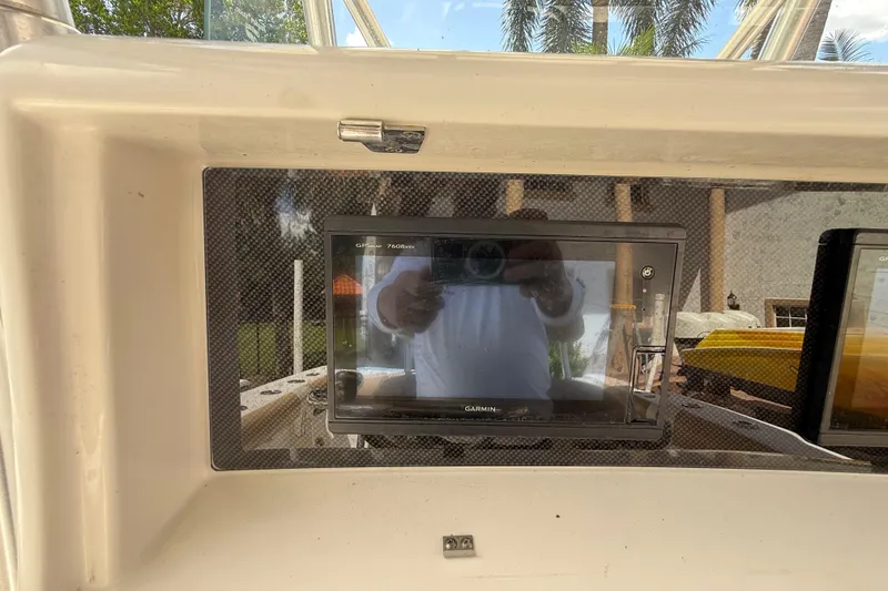 Slide: The Image of Garmin GPS display on 2007 Boston Whaler 270 Outrage boat dashboard. - 64