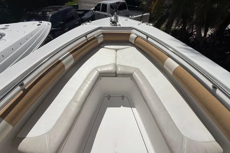 Slide: The Image of 2007 Boston Whaler 270 Outrage boat interior with cushioned seating and sleek design. - 73