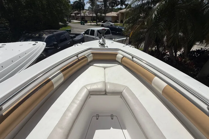 Slide: The Image of 2007 Boston Whaler 270 Outrage boat interior with cushioned seating and sleek design. - 74