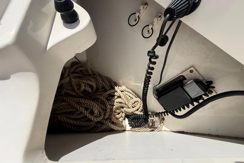 Slide: The Image of Coiled rope and equipment on 2007 Boston Whaler 270 Outrage boat. - 78