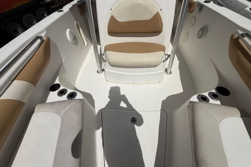 Slide: The Image of 2007 Boston Whaler 270 Outrage boat interior with seating and cup holders. - 81