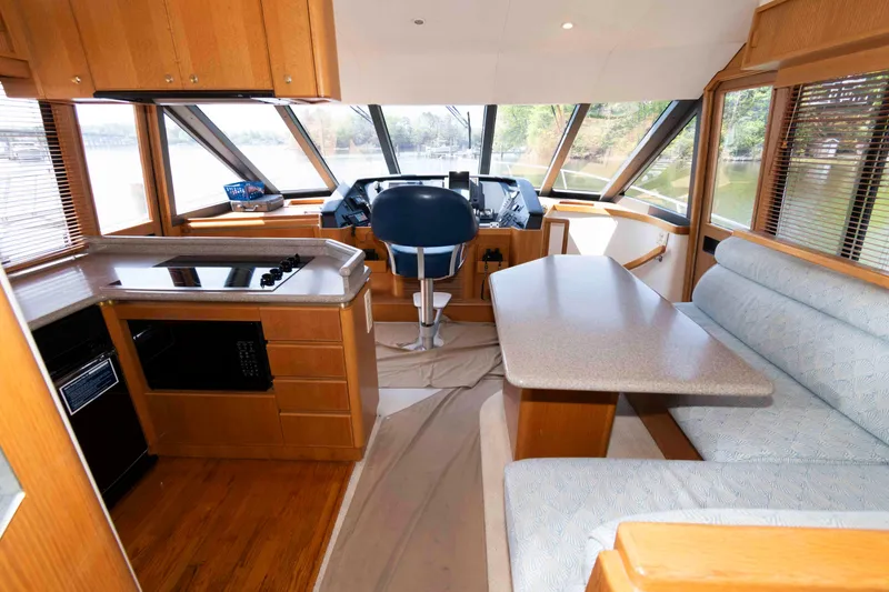 Slide: The Image of Luxurious kitchen in 1999 West Bay 58 Sonship Pilothouse yacht with modern appliances. - 22