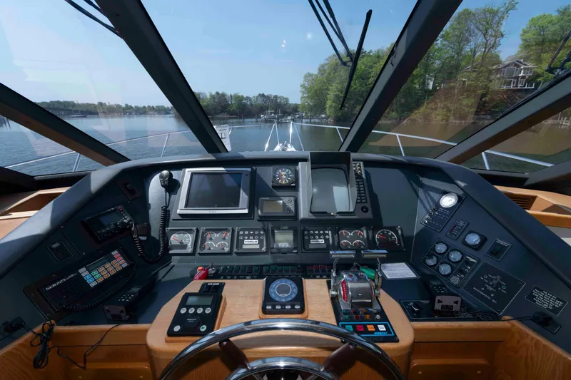 Slide: The Image of 1999 West Bay 58 Sonship Pilothouse MY interior with kitchen and seating area. - 27