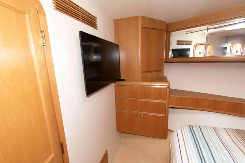 Slide: The Image of Luxurious bathroom in 1999 West Bay 58 Sonship Pilothouse MY yacht, featuring dual sinks and shower. - 35
