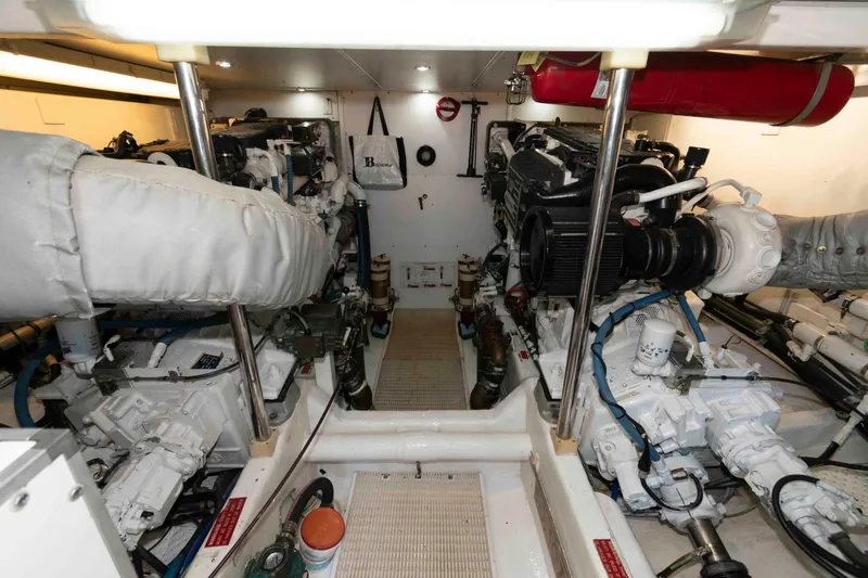 Slide: The Image of Engine room of 1999 West Bay 58 Sonship Pilothouse MY with mechanical components. - 41