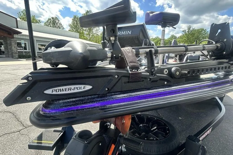 Slide: The Image of Close-up of a 2025 Phoenix 919 ZXL boat with Power-Pole and Garmin equipment. - 14