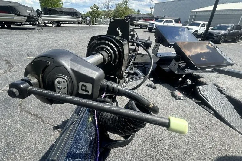 Slide: The Image of Close-up of Phoenix 919 ZXL boat controls and electronics, 2025 model, in a parking lot. - 19