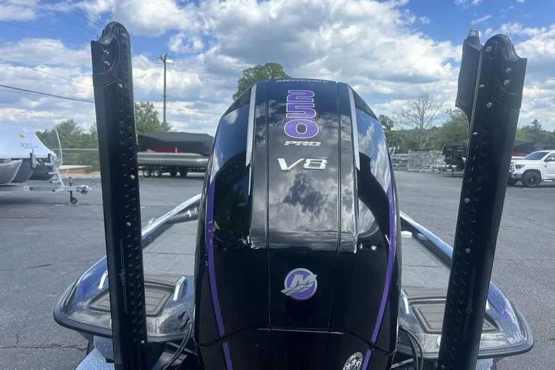 Slide: The Image of 2025 Phoenix 919 ZXL boat engine, V8 250 Pro, outdoors under cloudy sky. - 26