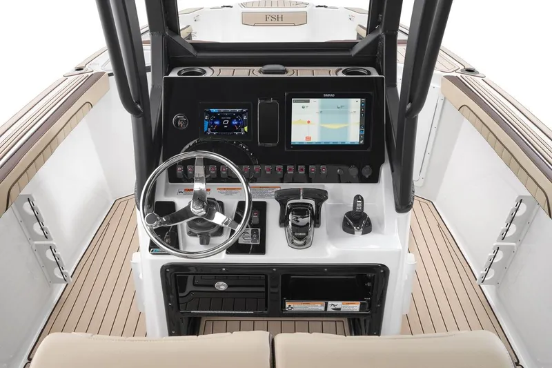 Slide: The Image of 2026 Yamaha Boats 255 FSH Sport E dashboard with advanced controls and navigation display. - 10