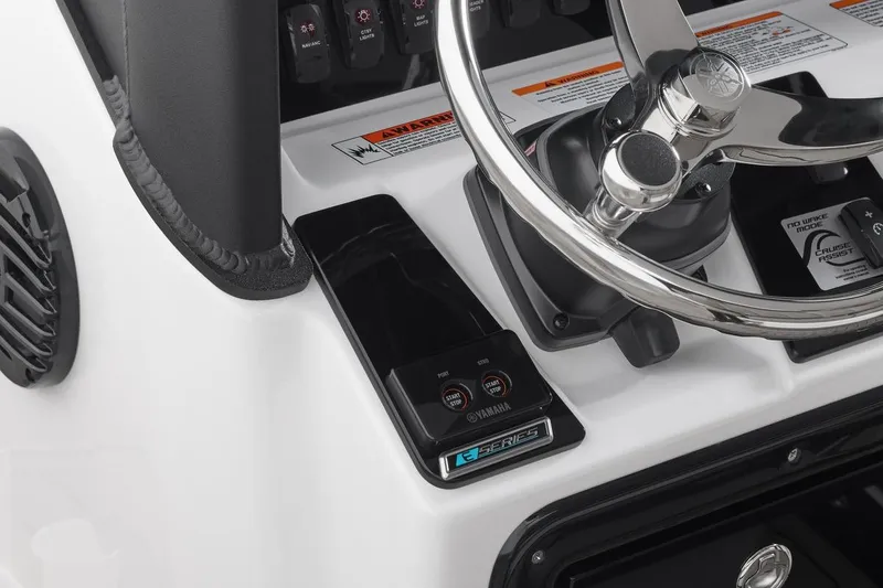 Slide: The Image of Steering console of 2026 Yamaha Boats 255 FSH Sport E, featuring modern controls and sleek design. - 12