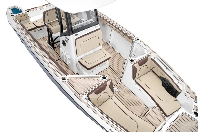 Slide: The Image of 2026 Yamaha Boats 255 FSH Sport E interior with beige seating and sleek design. - 13