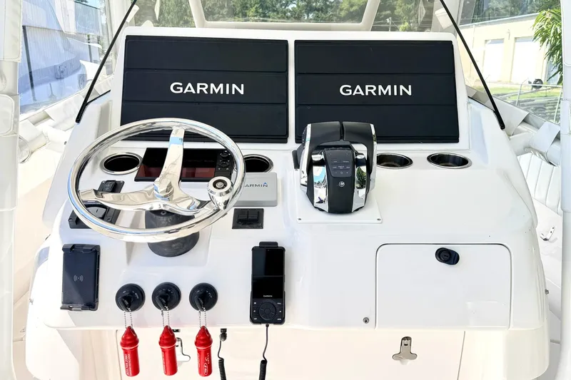 Slide: The Image of Helm of 2005 Intrepid 370 Center Console with Garmin displays and steering wheel. - 19