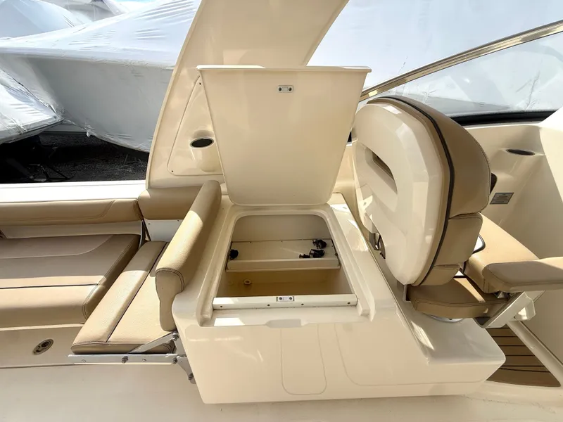 Slide: The Image of Interior of 2015 Scout 275 Dorado with storage under seat. - 12