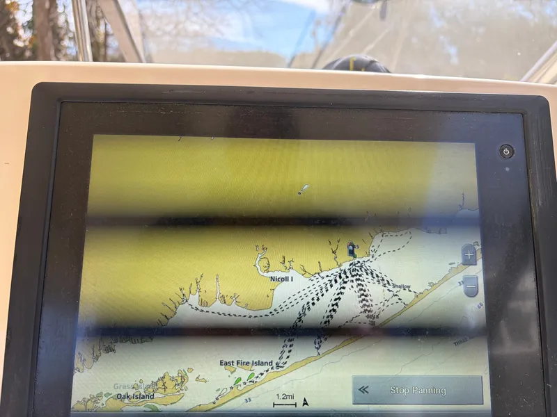 Slide: The Image of Navigation system on a 2015 Scout 275 Dorado boat. - 17