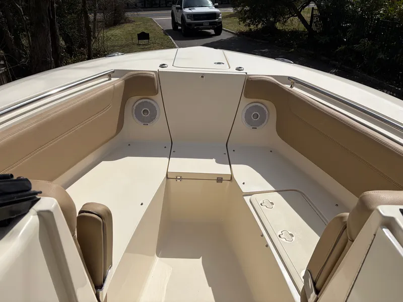 Slide: The Image of Interior of a 2015 Scout 275 Dorado boat with seating area. - 23