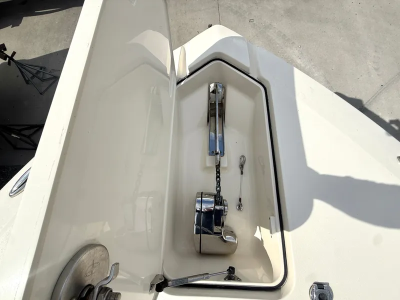 Slide: The Image of Anchor compartment of a 2015 Scout 275 Dorado boat. - 27