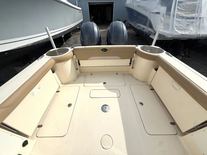 Slide: The Image of Interior of a 2015 Scout 275 Dorado boat with dual engines. - 6
