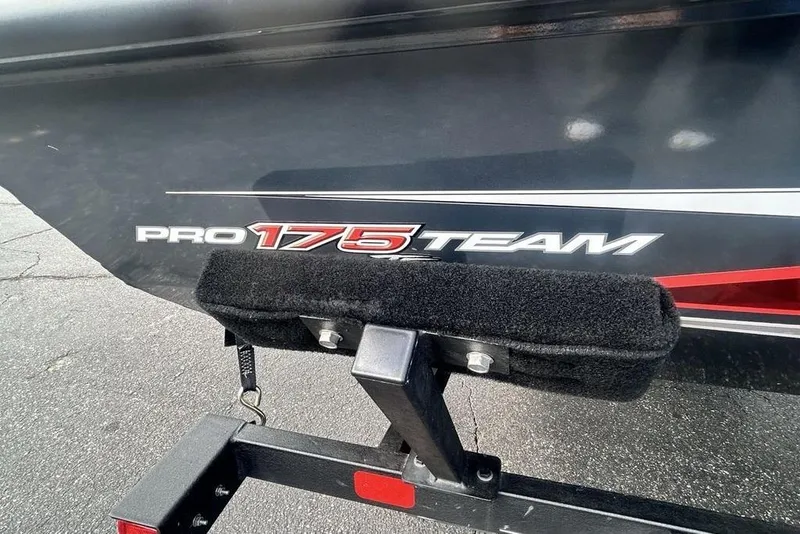 Slide: The Image of 2022 Tracker Pro Team 175 TF boat detail with logo and trailer. - 21