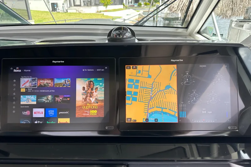 Slide: The Image of Dashboard of 2024 Formula 400 Super Sport Crossover with dual Raymarine displays. - 13