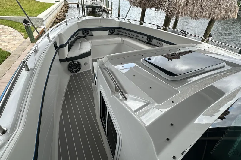 Slide: The Image of 2024 Formula 400 Super Sport Crossover boat interior with sleek seating and modern design. - 15