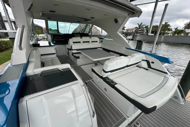 Slide: The Image of 2024 Formula 400 Super Sport Crossover luxury yacht interior with sleek seating and modern design. - 22