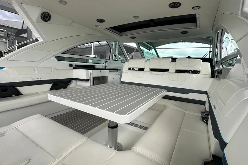 Slide: The Image of 2024 Formula 400 Super Sport Crossover interior with sleek seating and modern table design. - 25