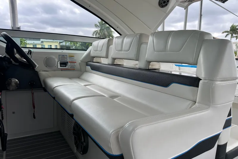 Slide: The Image of 2024 Formula 400 Super Sport Crossover interior with luxurious white seating and modern dashboard. - 27