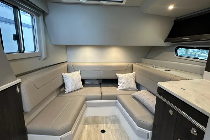 Slide: The Image of 2024 Formula 400 Super Sport Crossover interior with elegant seating and modern design. - 32