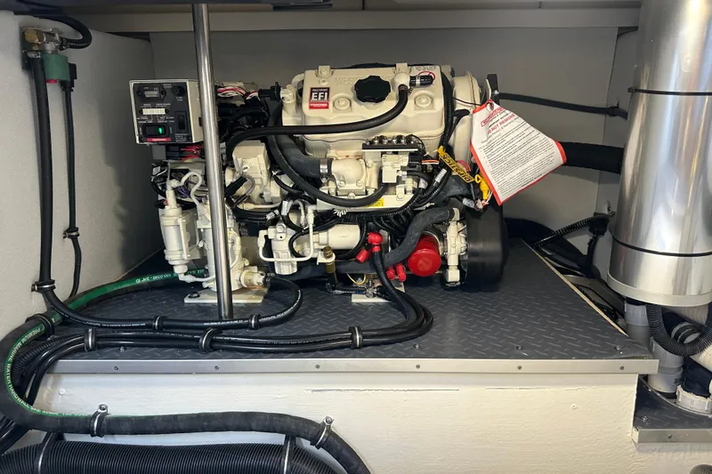 Slide: The Image of Engine compartment of 2024 Formula 400 Super Sport Crossover boat, showcasing mechanical components. - 39