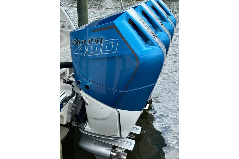 Slide: The Image of 2024 Formula 400 Super Sport Crossover with blue Racing 400 outboard engines. - 6